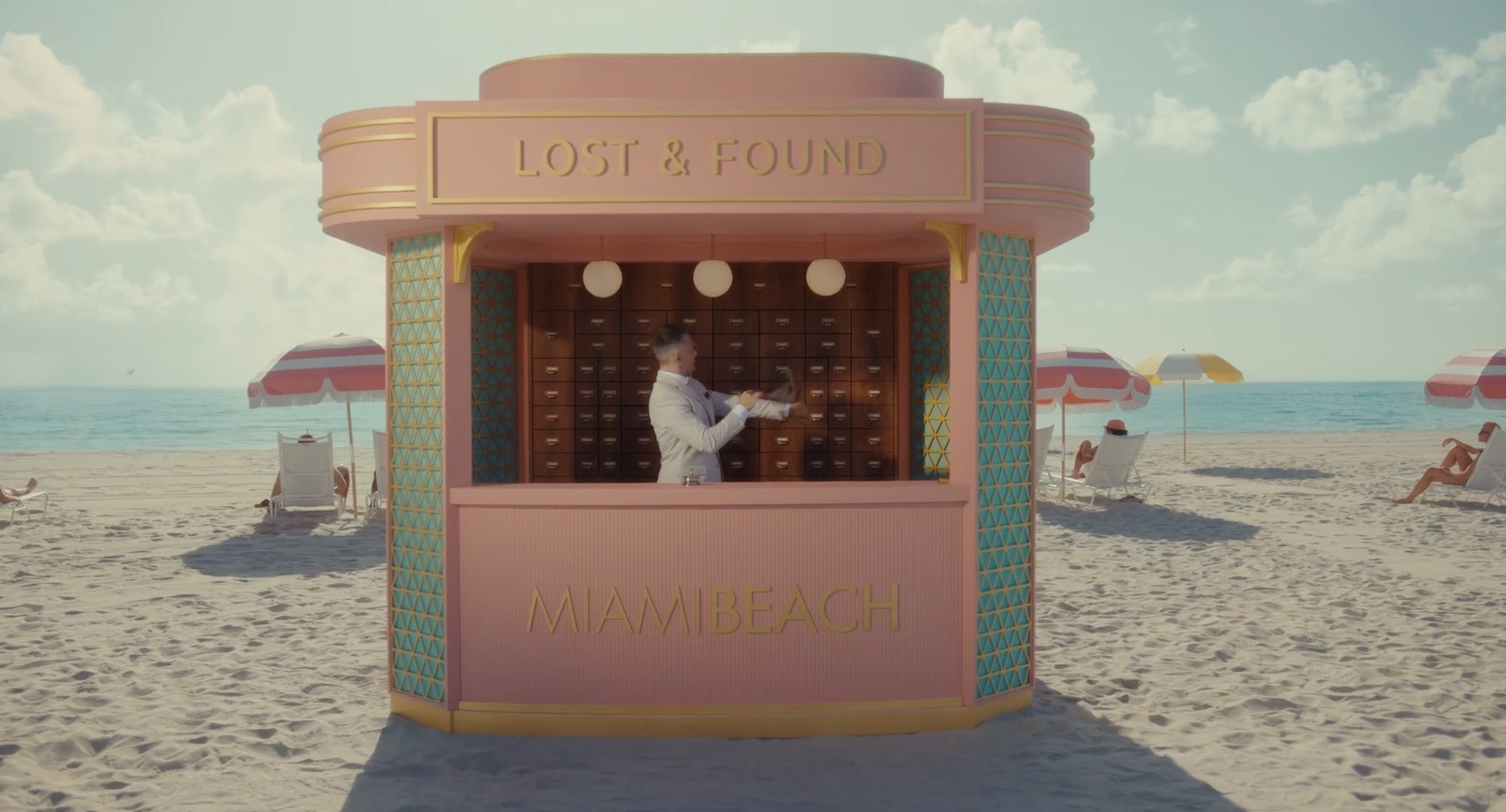 Pastel-pink Lost and Found booth on Miami Beach